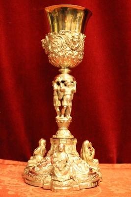 Exceptional Chalice With Paten And Original Case. Weight: 954 Gram.3  Silver Images As Nodus And Full Silver Imaginations Of Faith, Hope And Love On The Base. style Baroque en full silver, 19th century ( anno 1840 )