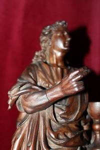 High Quality Statue Of St. John Evangelist style baroque en hand-carved wood, Lime Tree, Belgium 17 th century