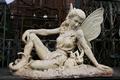 Cast Iron Statue : Sitting Fairy en Cast Iron, 20th century
