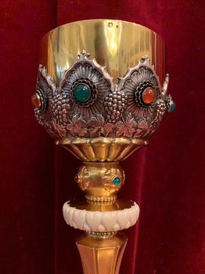 Chalice en Silver, partly gilt,red and green gemstone cabochons, nodule with ivory, Hungary 19 th century
