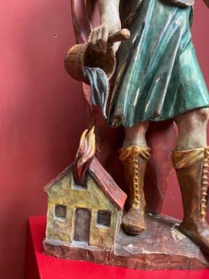 St. Florian Statue en Carved Wood Polychrome, Southern Germany 20th century