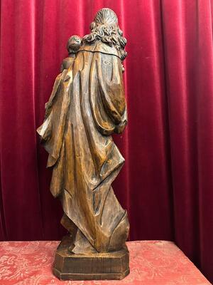 St. Mary With Child Sculpture. en Hand - Carved Wood , 20 th century